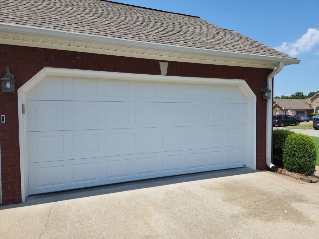 White short panel traditional garage door