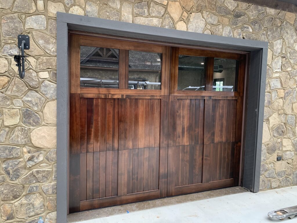 Faux wood carriage garage door with windows 