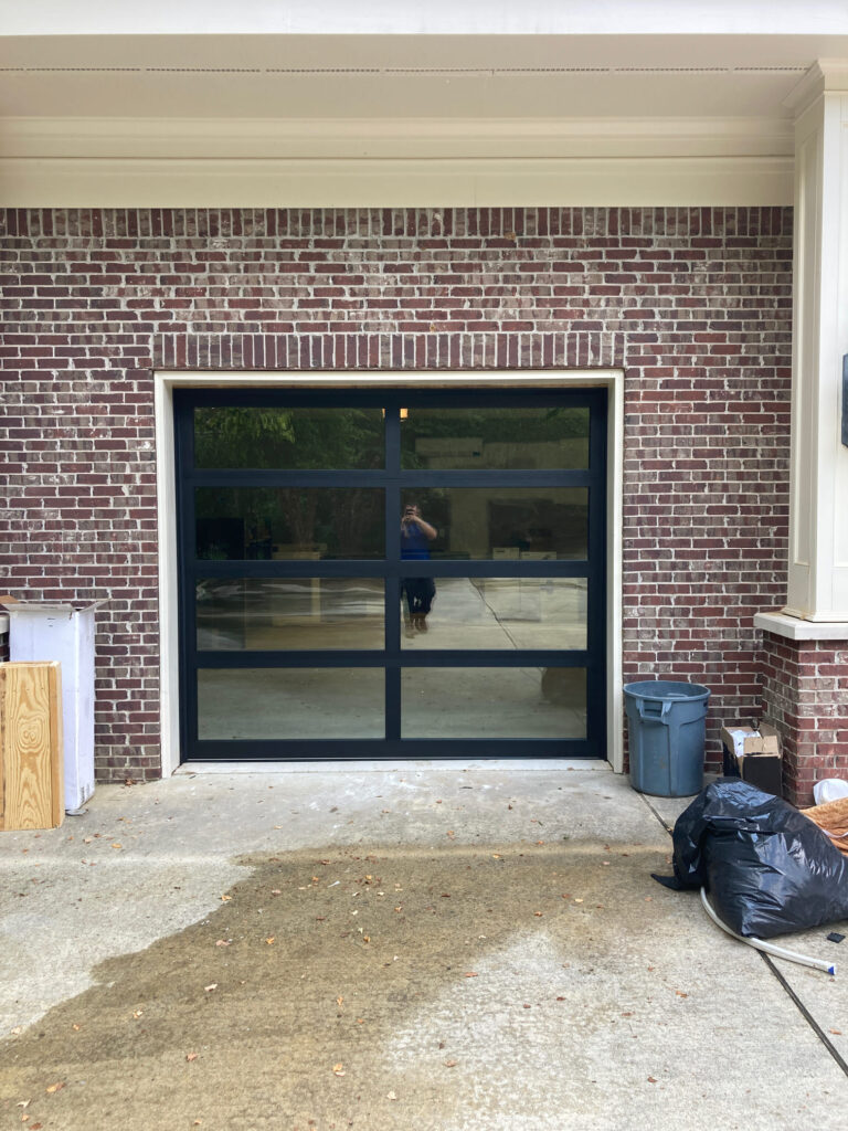 Black frame glass garage door