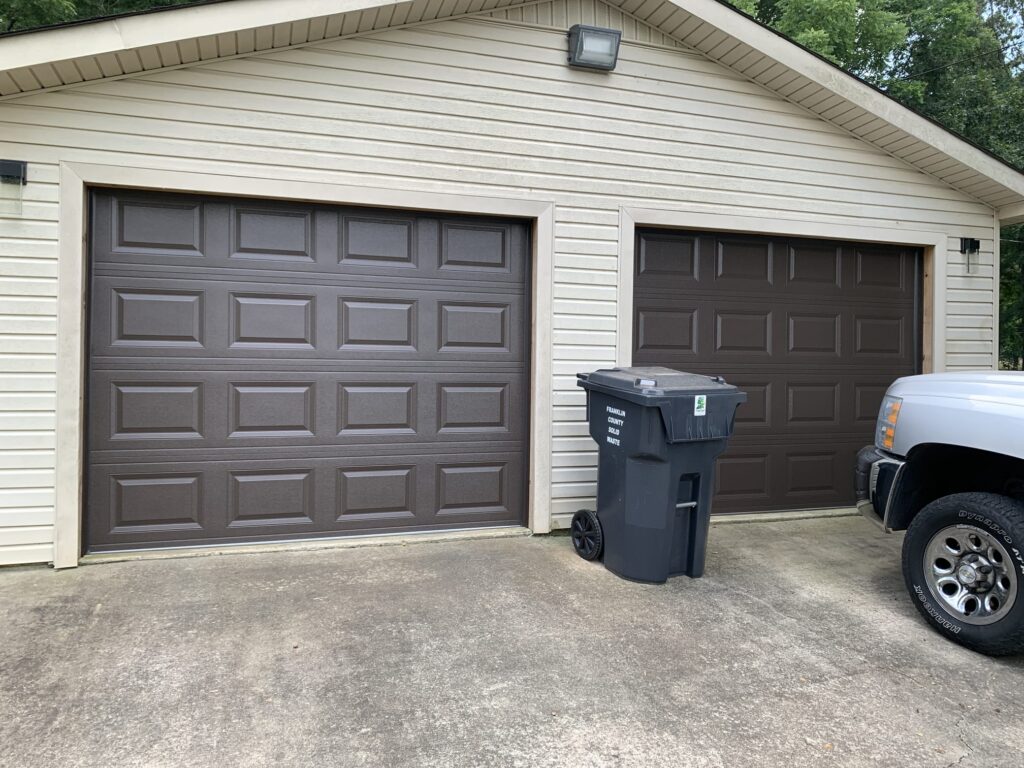 Brown traditional short panel garage doors 