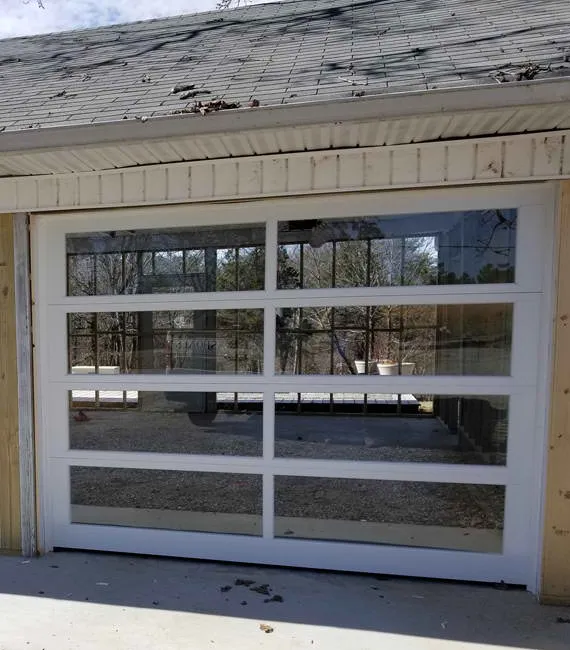 Full view garage door with long panels.