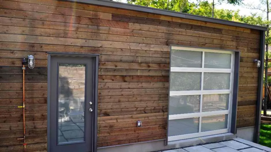 Modern glass garage door with white frame