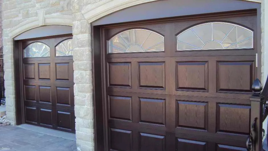 Faux wood traditional garage doors with windows 