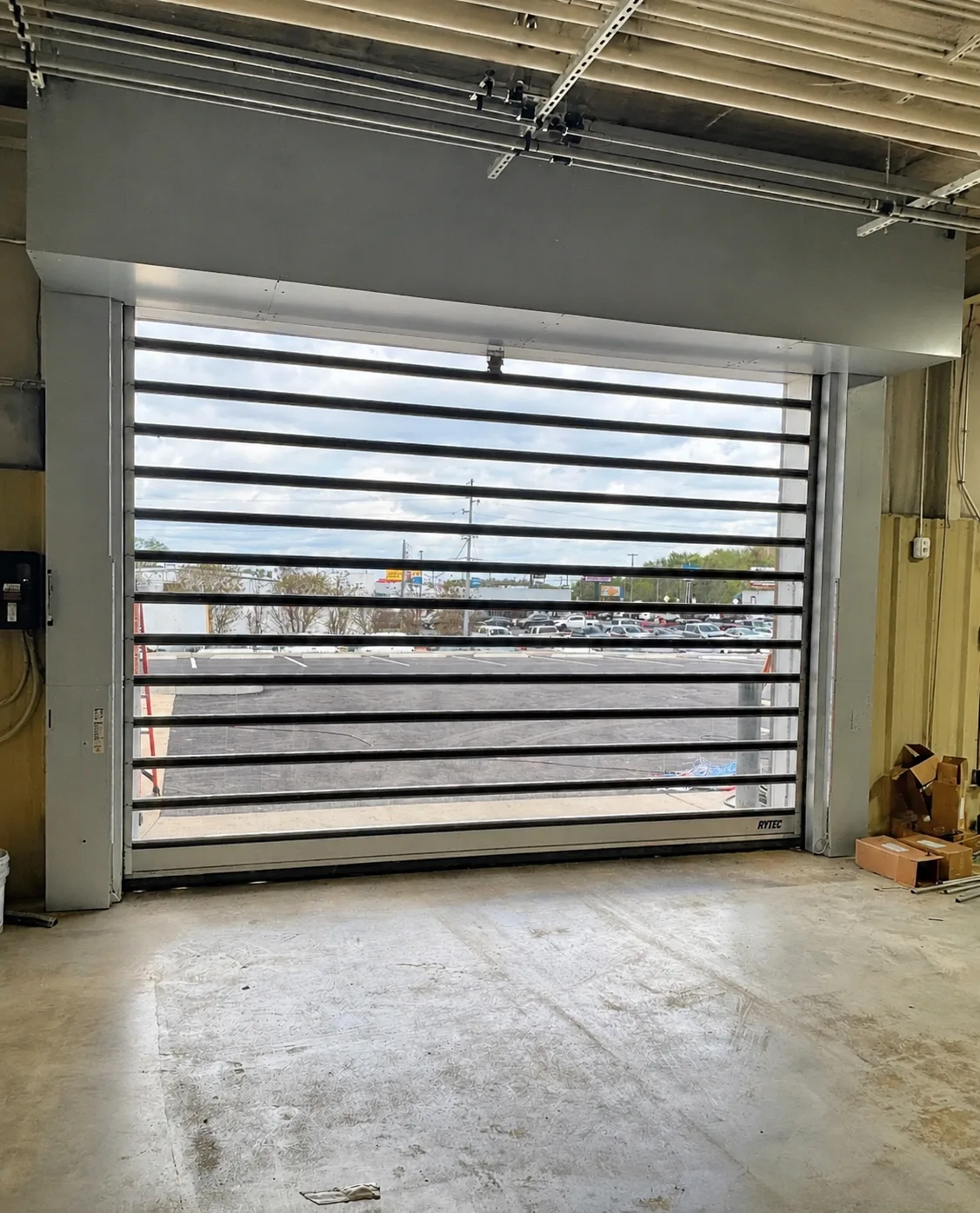 Commercial rolling security door installation
