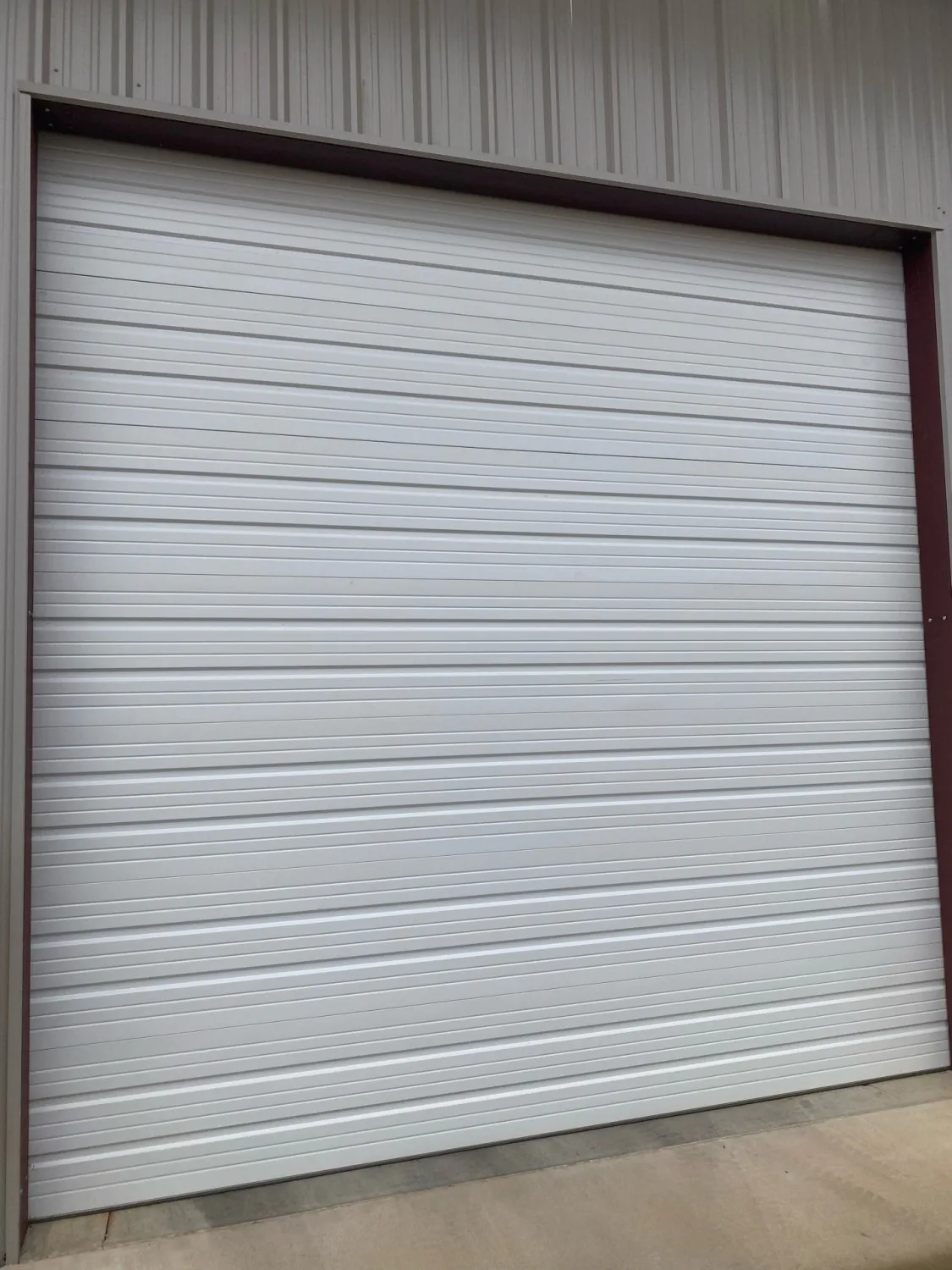 Commercial overhead door panel after repair