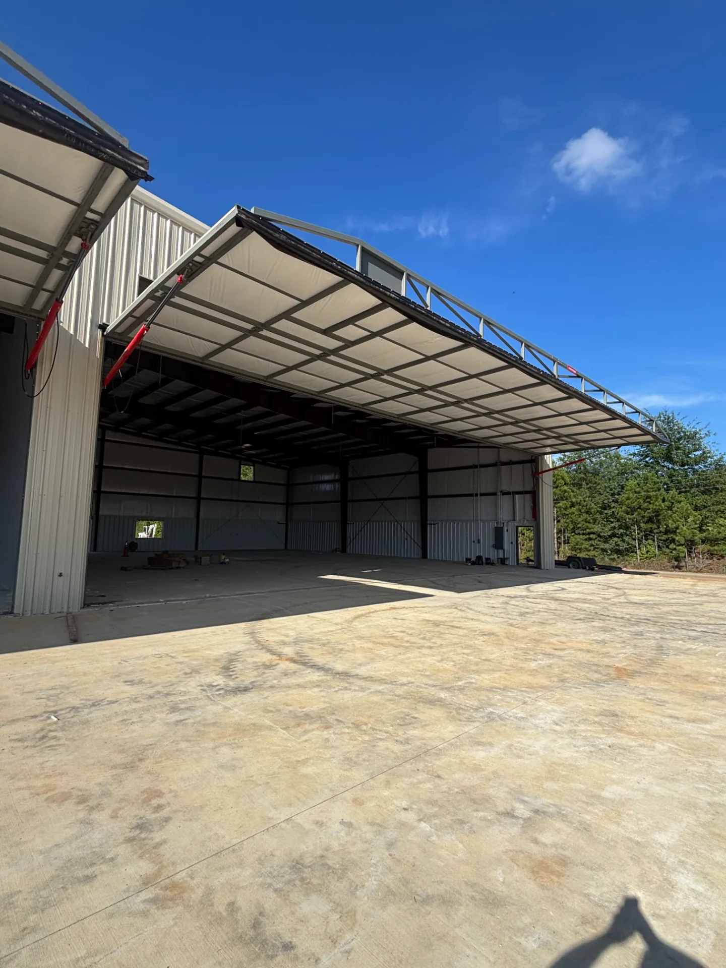 Commercial facility overhead door opening